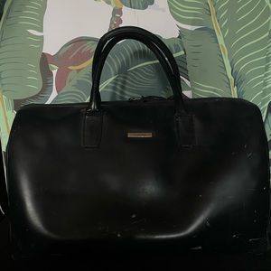 Vintage Gucci overnight black bag.